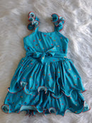 Vestido Infantil Com Dupla Saia Ondulada Elegância em Dose Dupla!